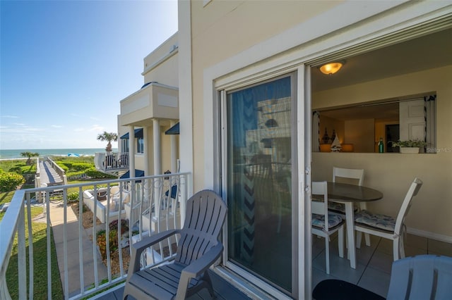 balcony featuring a water view