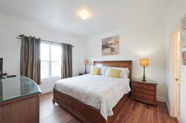 bedroom featuring dark wood-type flooring