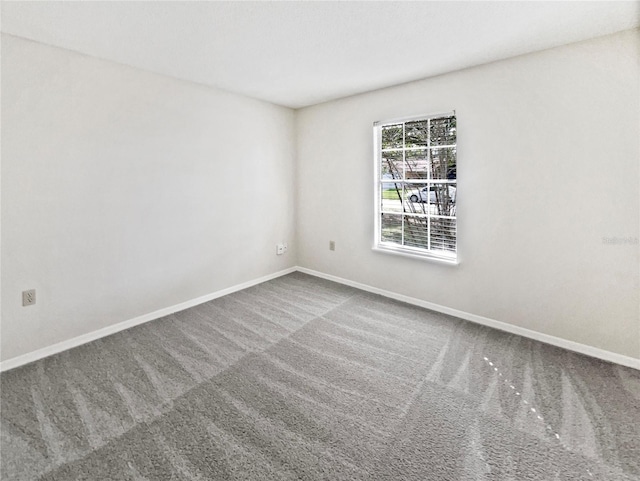 5119 Timber Ridge Trl, Ocoee, FL 34761 - empty room featuring carpet floors and baseboards