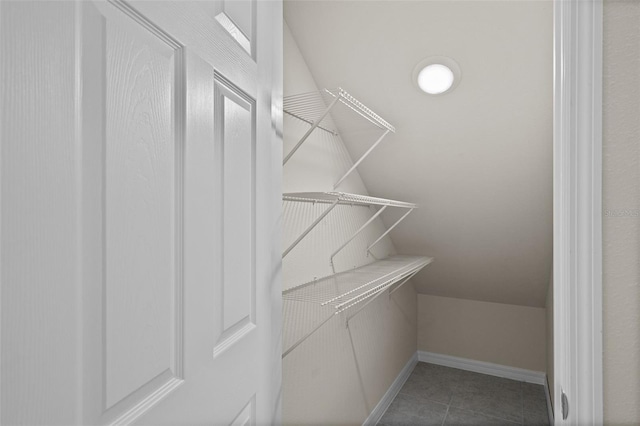 spacious closet with tile patterned flooring