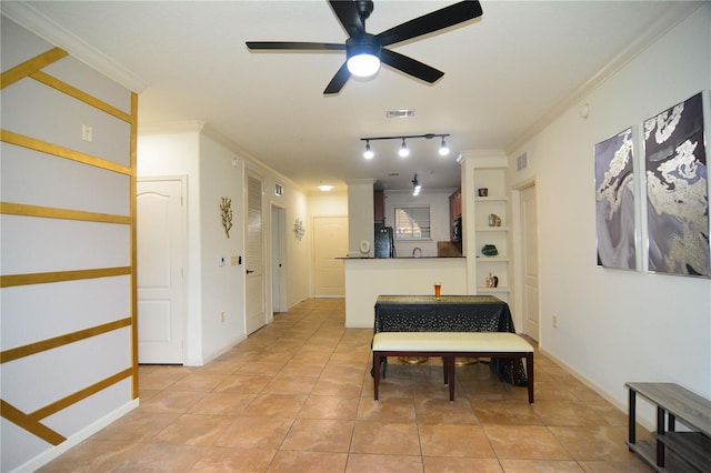 hallway featuring light tile patterned flooring and ornamental molding