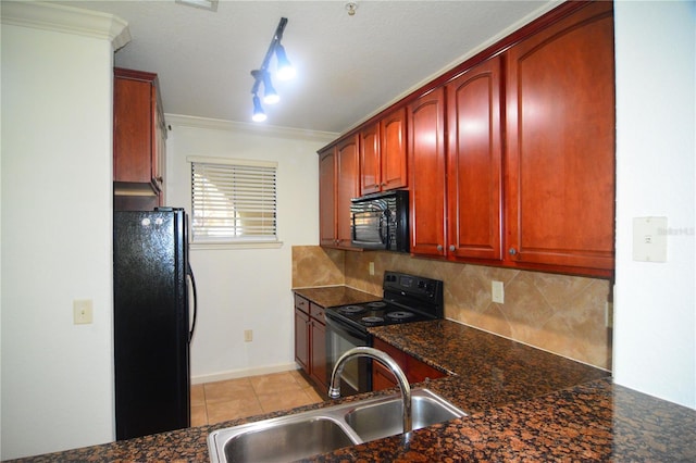 kitchen featuring black appliances, dark stone countertops, ornamental molding, and sink