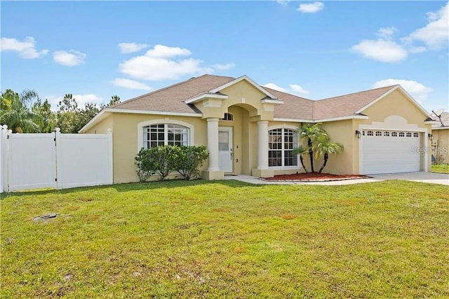 ranch-style house with a garage and a front lawn