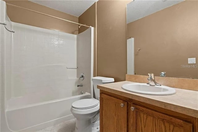 full bathroom featuring vanity, toilet, and tub / shower combination