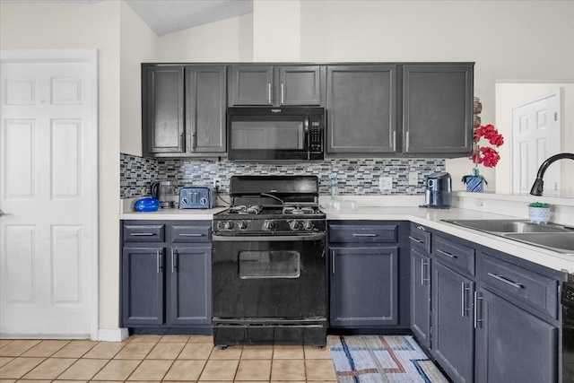 kitchen with backsplash, sink, black appliances, lofted ceiling, and light tile patterned flooring