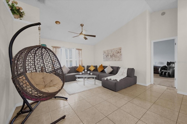 living room with ceiling fan, light tile patterned floors, and high vaulted ceiling