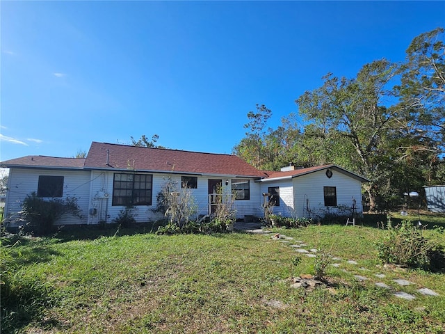 exterior space with a front lawn