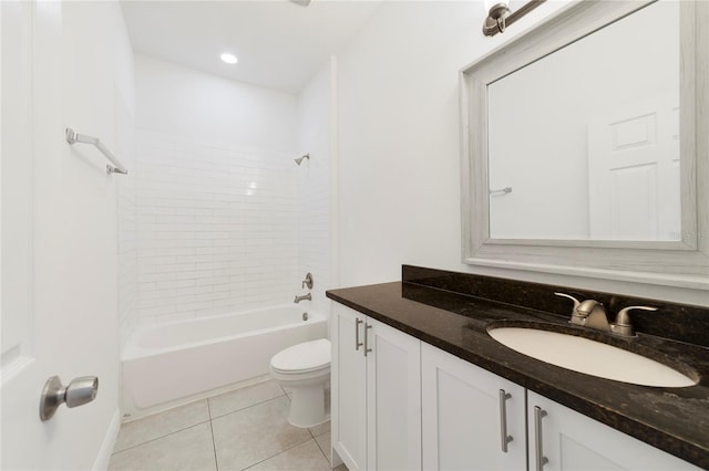 full bathroom with tile patterned floors, vanity, toilet, and tiled shower / bath