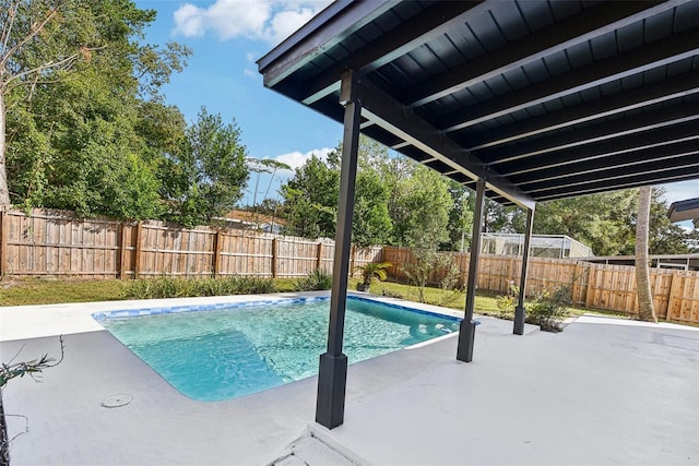 view of pool featuring a patio area