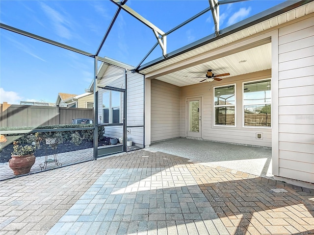 view of patio / terrace with a lanai and ceiling fan