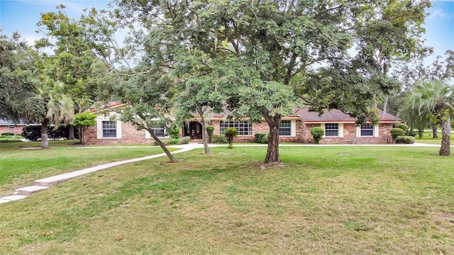 view of front of house with a front lawn