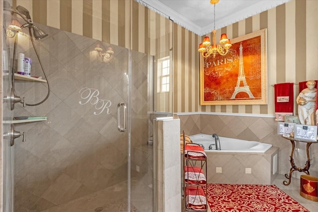 bathroom with shower with separate bathtub and a notable chandelier