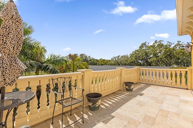 view of patio / terrace with a balcony