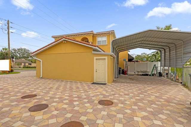 view of patio featuring a carport