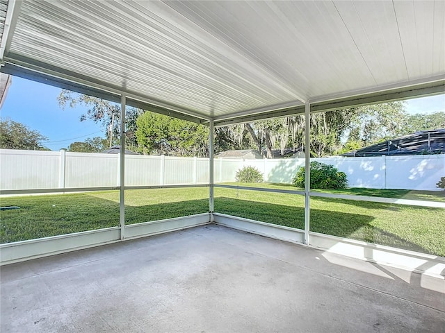 unfurnished sunroom featuring a wealth of natural light