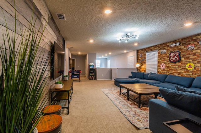 7400 Oakmoss Loop, Davenport, FL 33837 - living room featuring brick wall, light carpet, and a textured ceiling