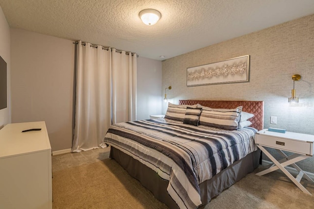 carpeted bedroom with a textured ceiling