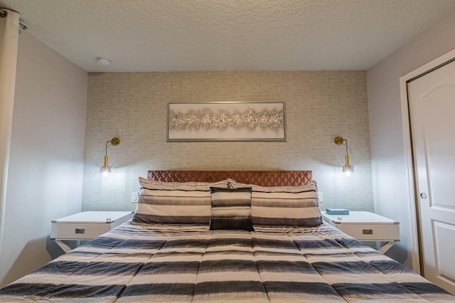 bedroom with a textured ceiling