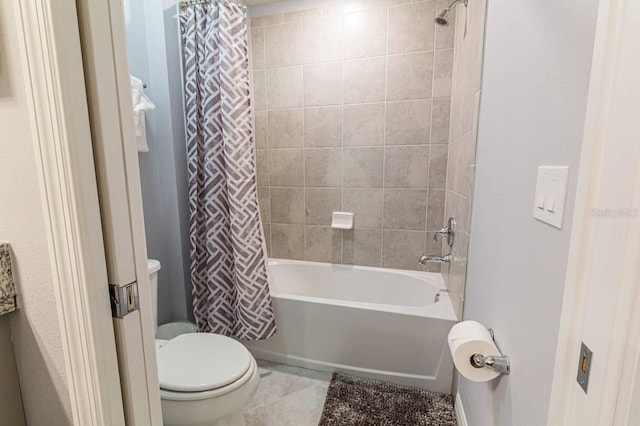 7400 Oakmoss Loop, Davenport, FL 33837 - bathroom with shower / tub combo with curtain, toilet, and tile patterned floors