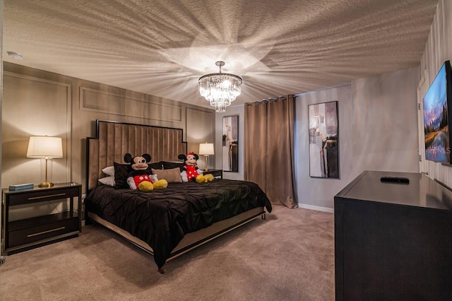 bedroom with carpet floors, a textured ceiling, and an inviting chandelier