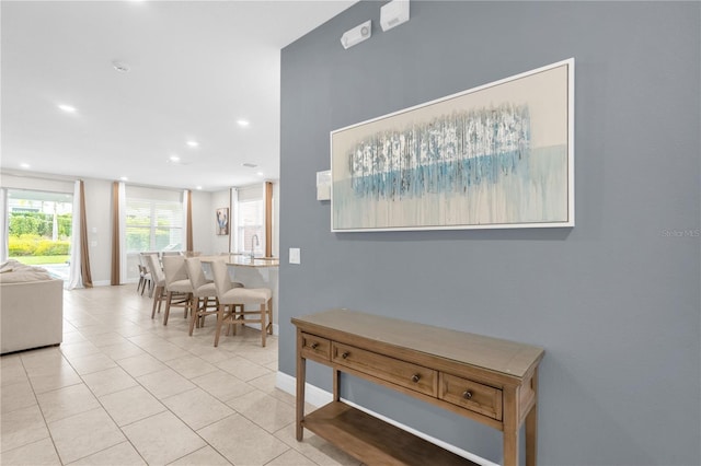 dining area featuring light tile patterned floors