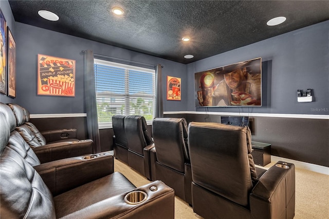 carpeted cinema featuring a textured ceiling