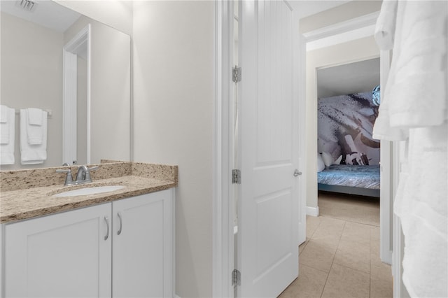 bathroom featuring tile patterned floors and vanity