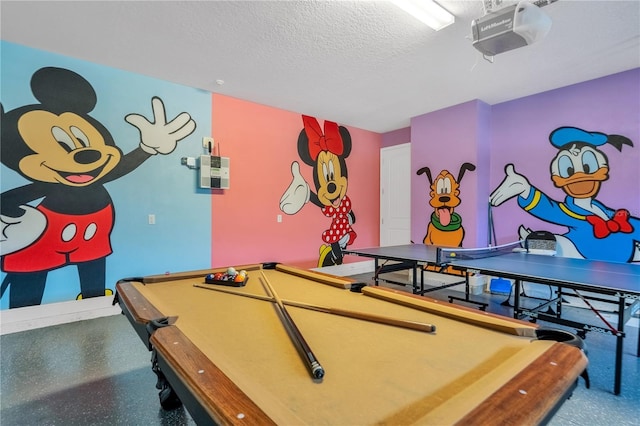 recreation room featuring a textured ceiling and billiards