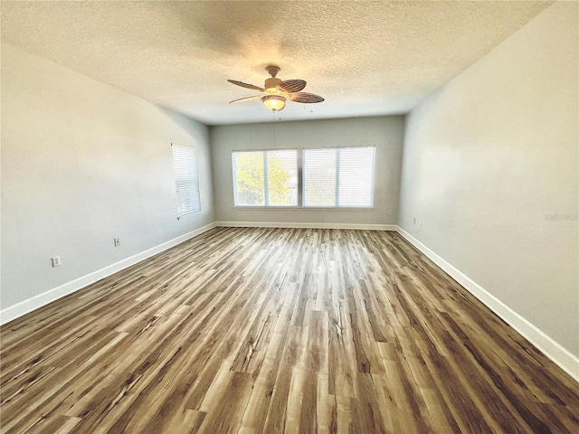 unfurnished room with a textured ceiling, hardwood / wood-style flooring, and ceiling fan