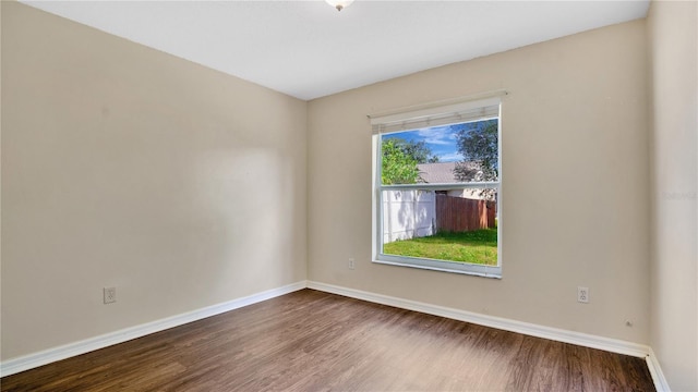 unfurnished room featuring hardwood / wood-style floors