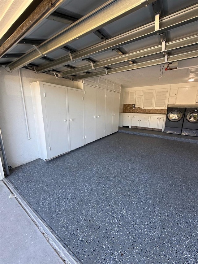 garage featuring independent washer and dryer