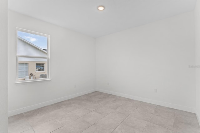 view of tiled spare room