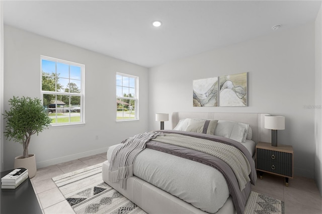 bedroom with light tile patterned flooring