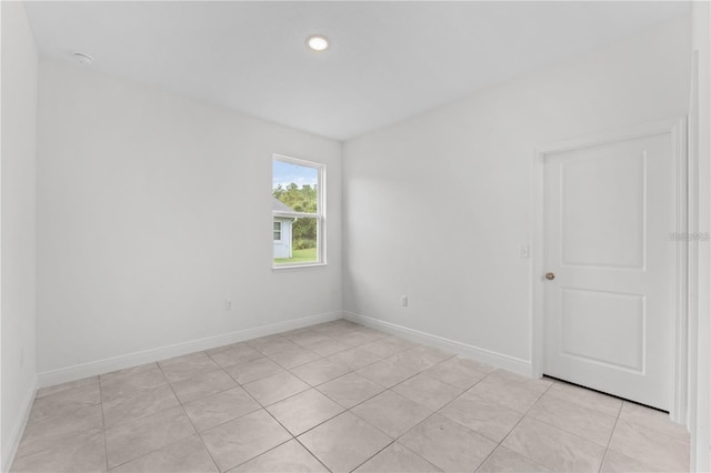 view of tiled spare room