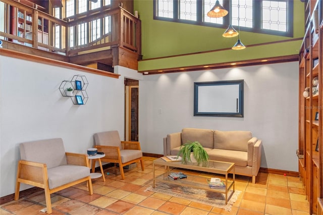 living room featuring a high ceiling