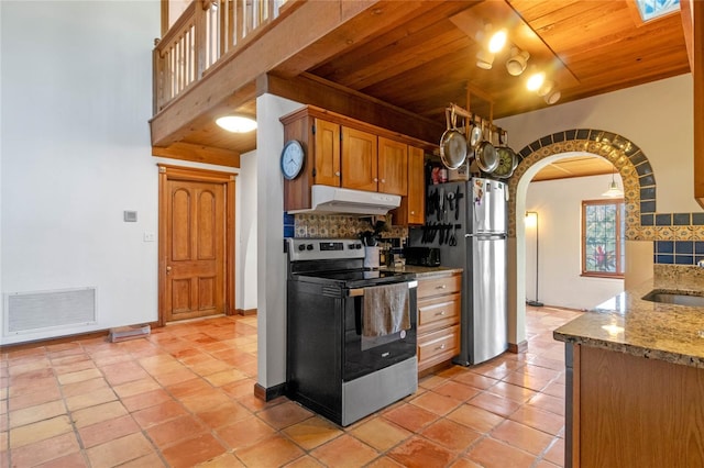 kitchen with backsplash, light stone counters, wood ceiling, and stainless steel appliances