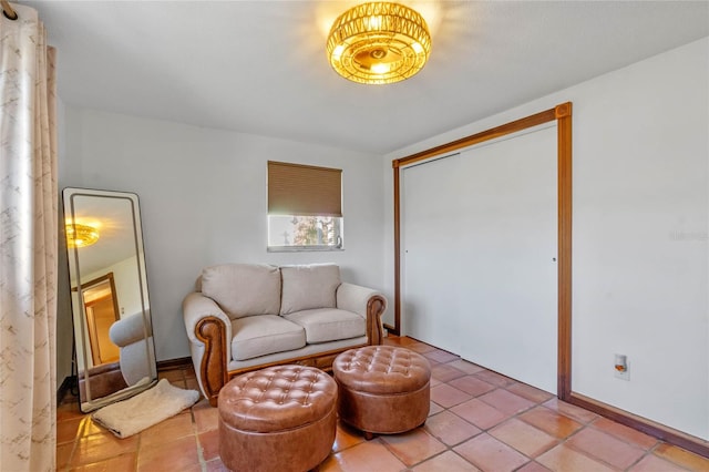 living area featuring light tile patterned floors