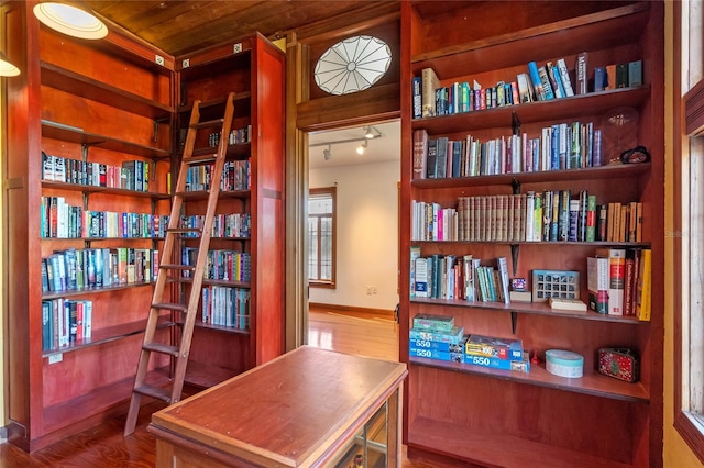 office with hardwood / wood-style floors and wood ceiling