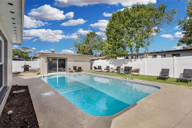 view of pool with a patio area and an outdoor hangout area