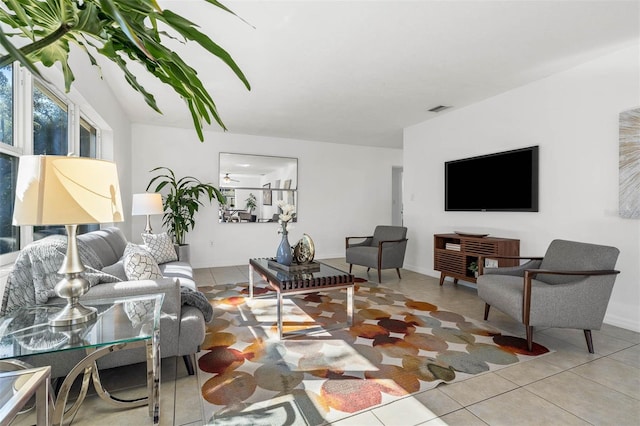 living room with light tile patterned floors