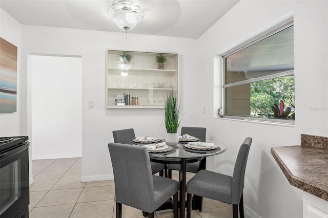 dining space with light tile patterned flooring