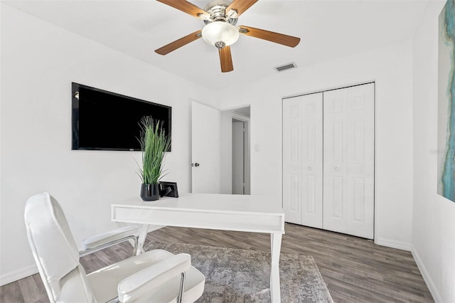 office area with hardwood / wood-style flooring and ceiling fan