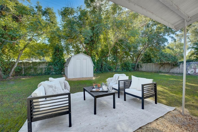 view of patio featuring outdoor lounge area and a storage shed