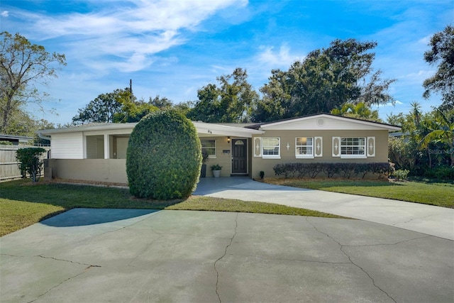 single story home featuring a front yard