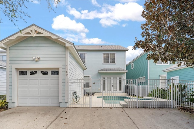 back of property with a patio