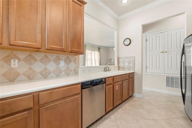 kitchen featuring backsplash, stainless steel appliances, crown molding, sink, and light tile patterned flooring