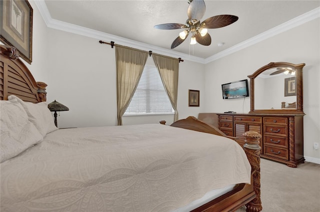 bedroom with light colored carpet, ceiling fan, and crown molding