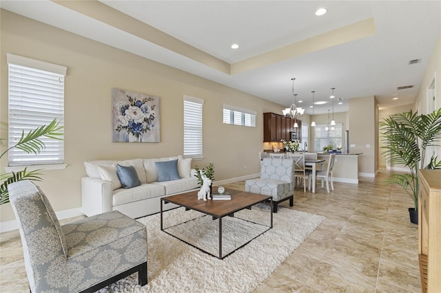 living room featuring a chandelier