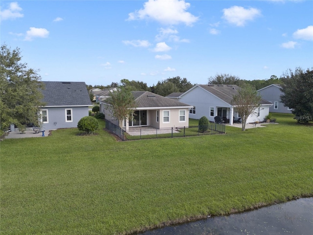 view of front of home featuring a front lawn