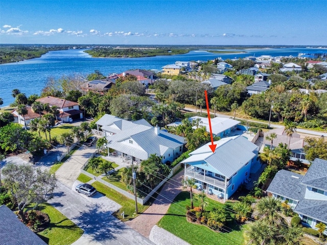 drone / aerial view with a water view